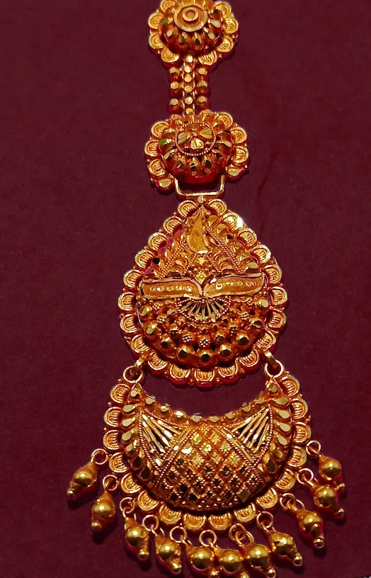 Gold maang tikka headpiece with crescent and bead drops